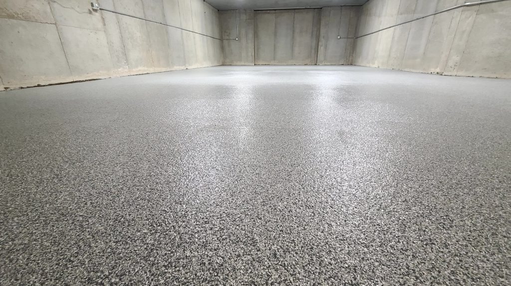The Longevity of Commercial Flake Epoxy in Cleveland, MO airplane hangar concrete coatings cleveland mo min
