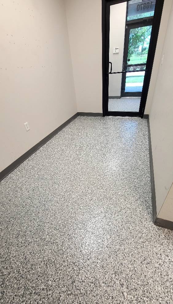 Entry vestibule with 1/4-inch flake epoxy flooring at Butler Supply in Lenexa, Kansas