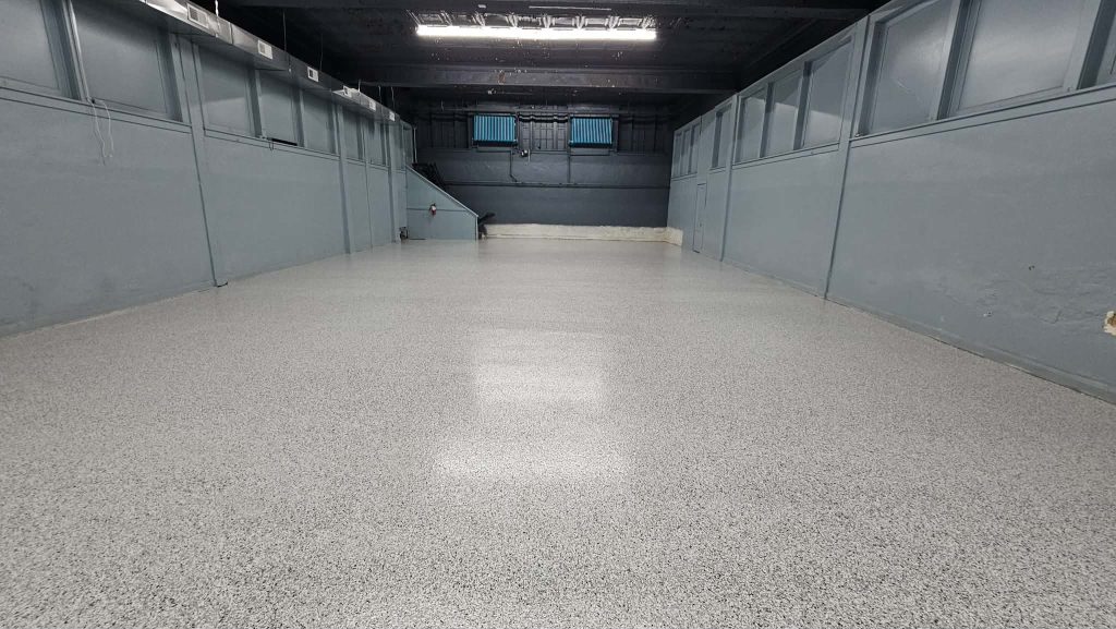 6,000 sq ft flake floor coating in the fellowship hall and gym at Central Baptist Church, Kansas City